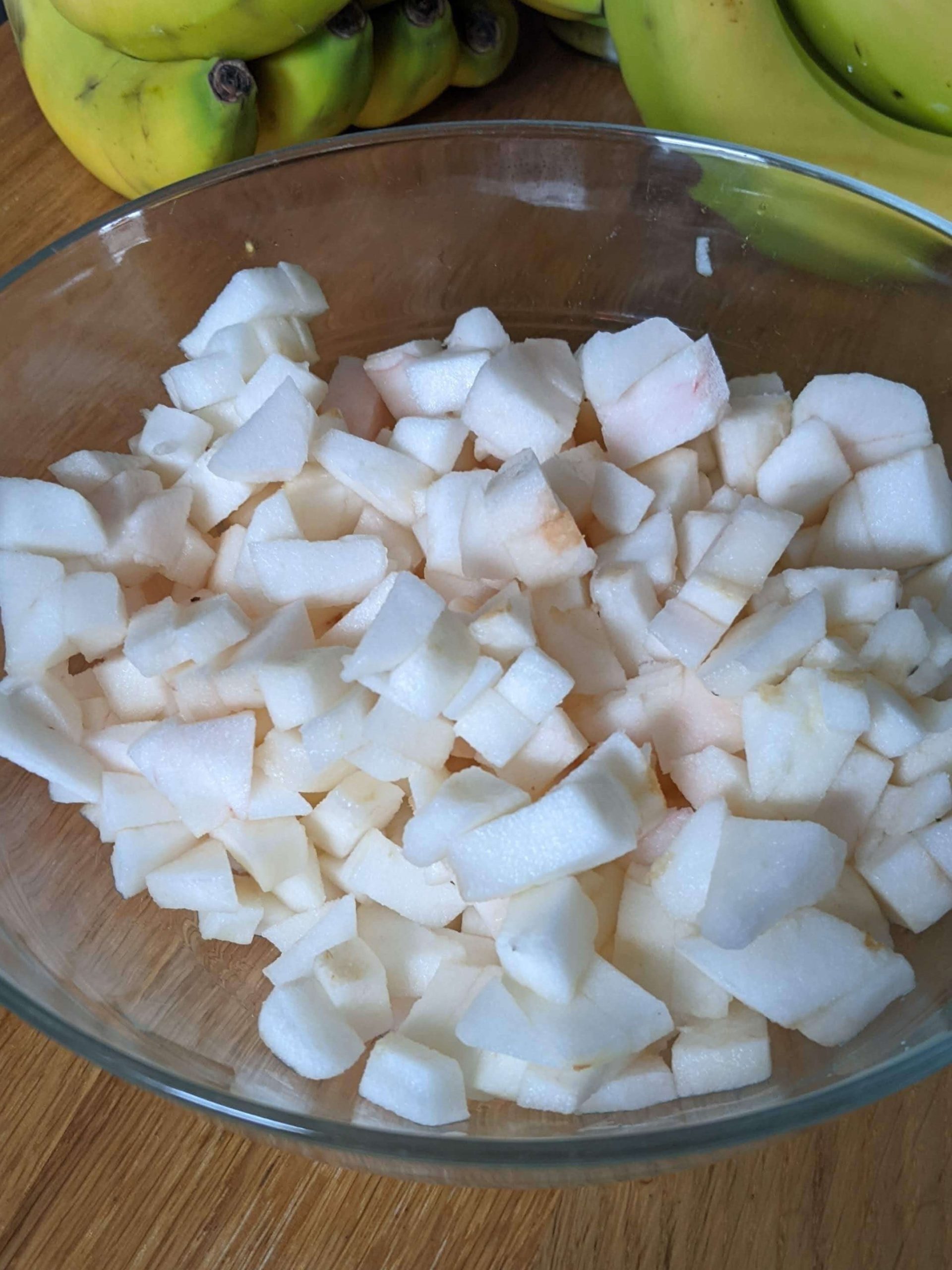 diced apples in a glass bowl