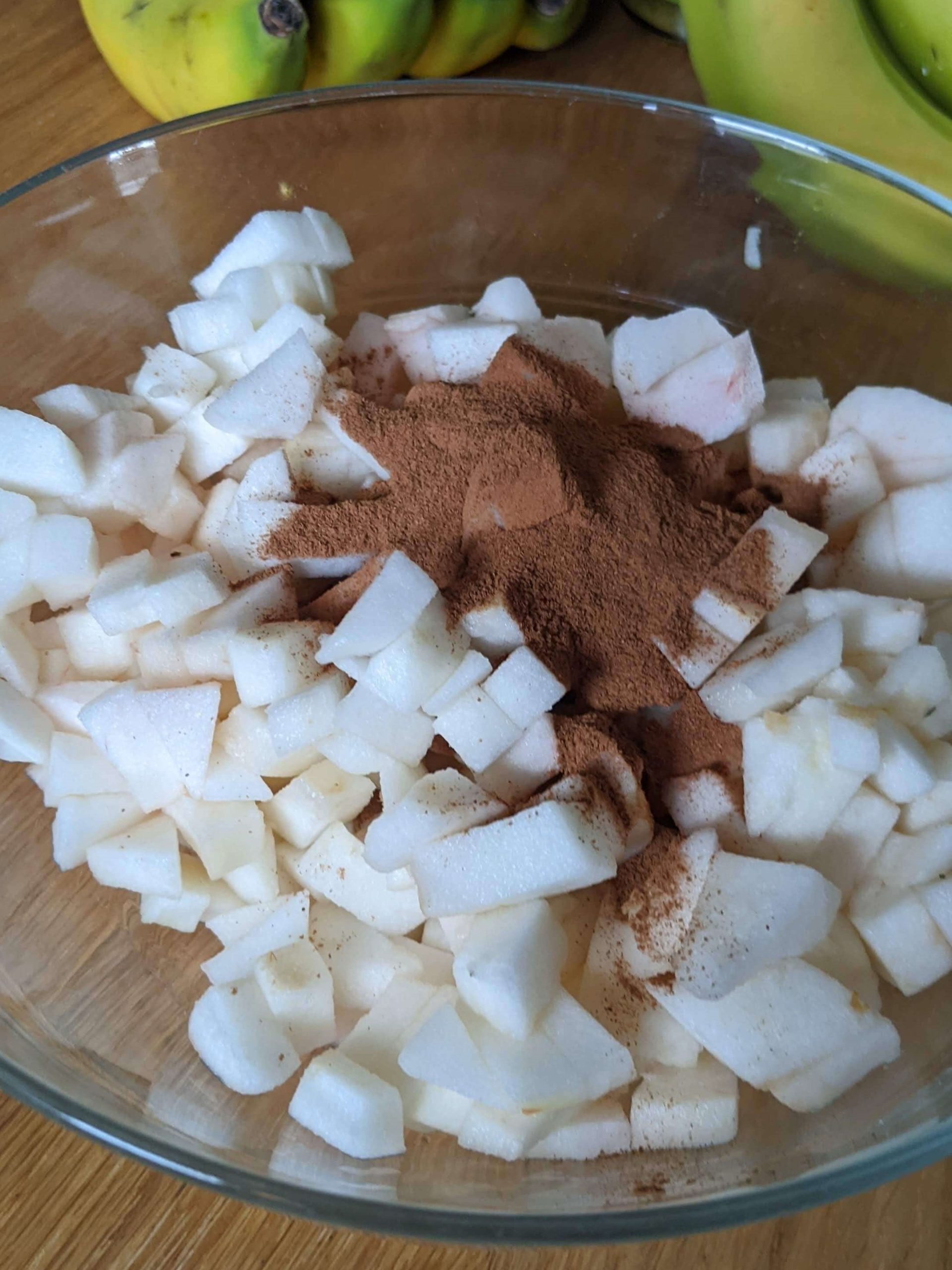 diced apples with cinnamon on top