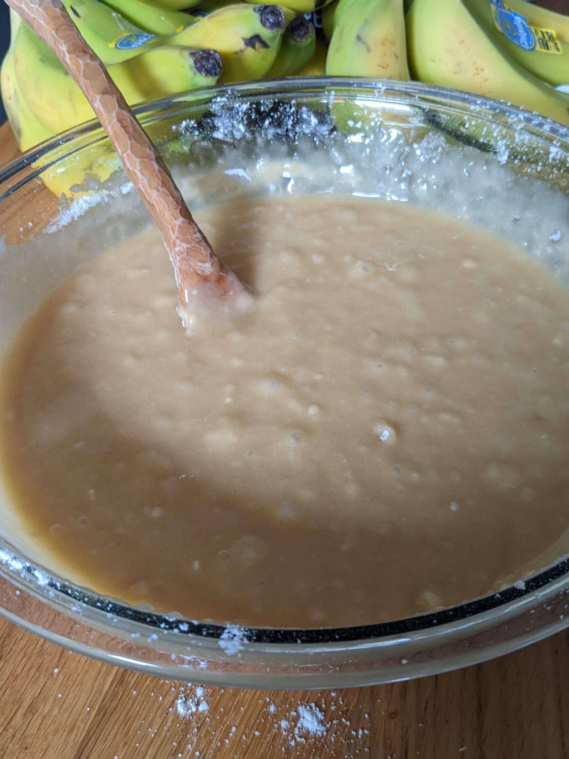 batter in a bowl with a wooden sppon