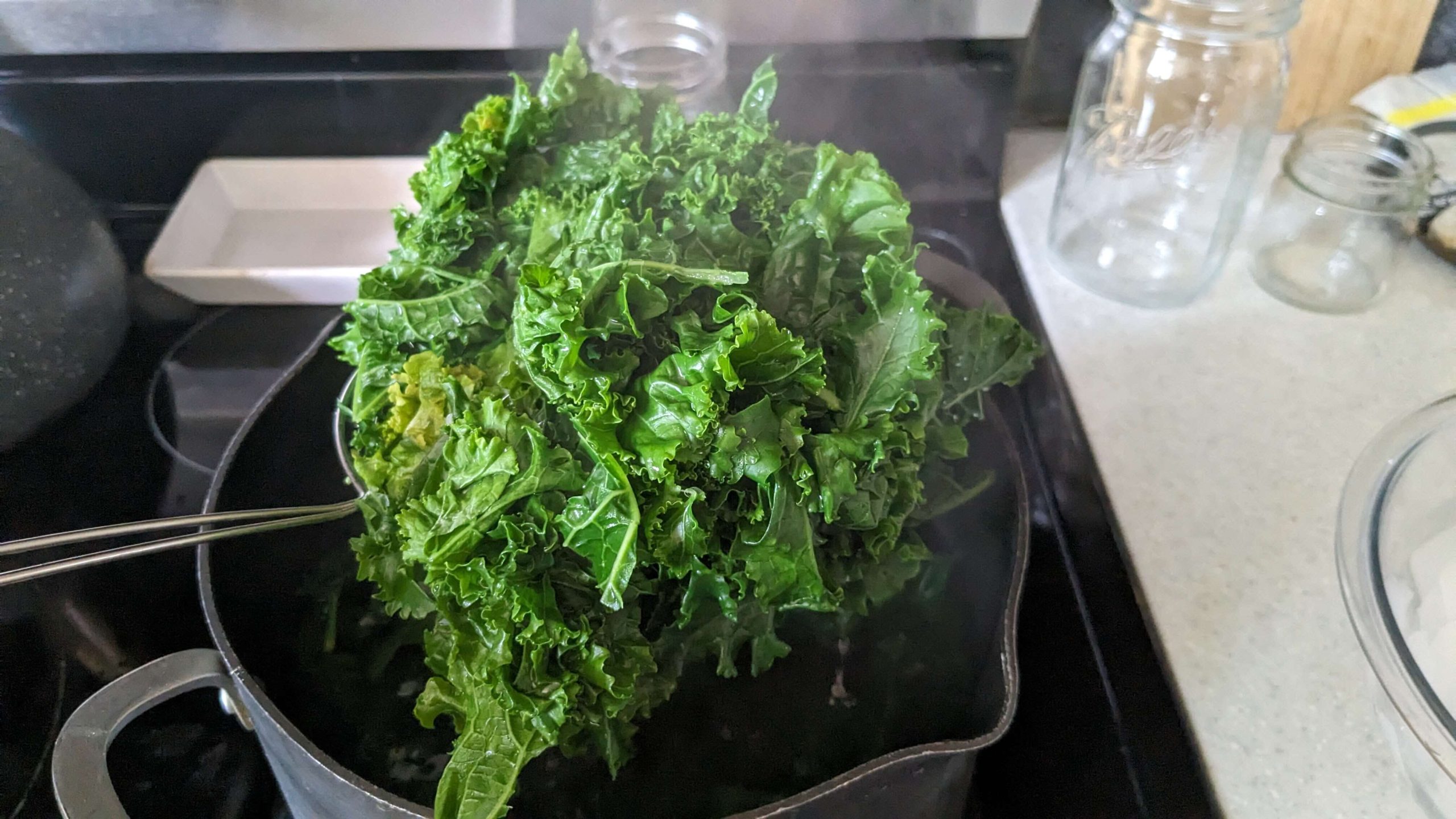 blanched kale above a pot
