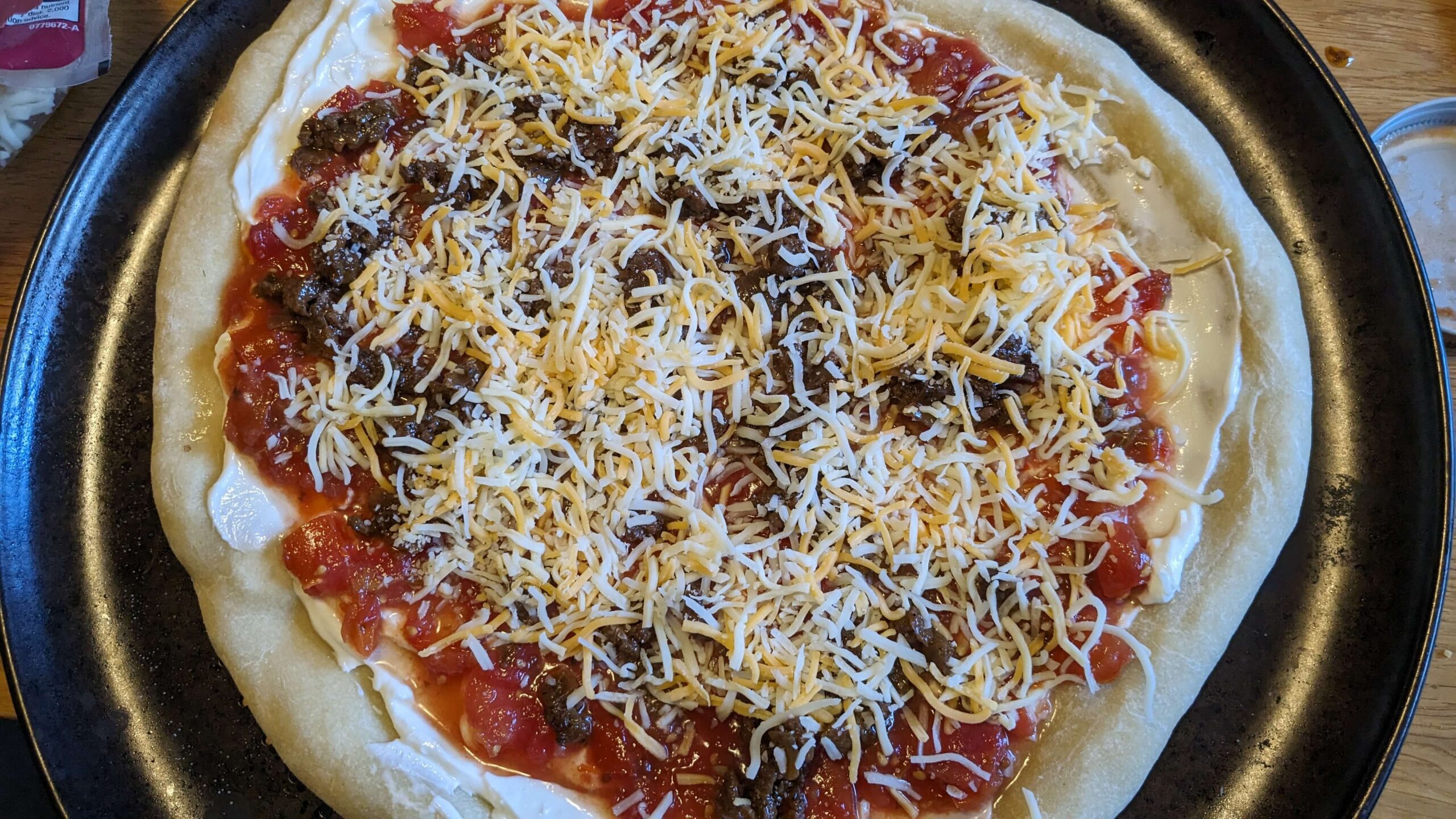 uncooked taco pizza 
