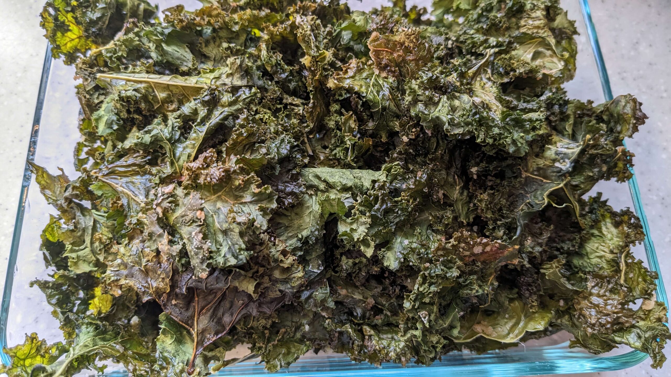 kale chips in a glass container