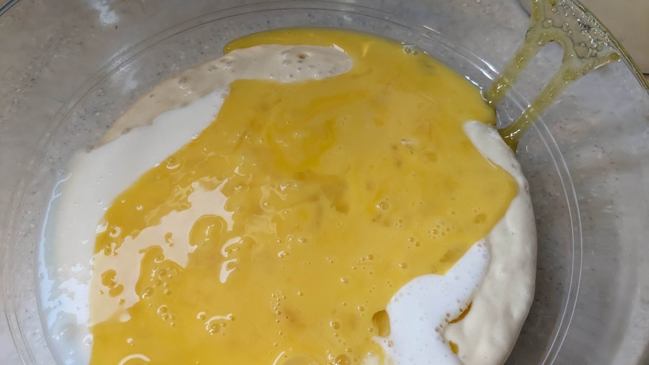 raw scrambled eggs on top of sourdough discard