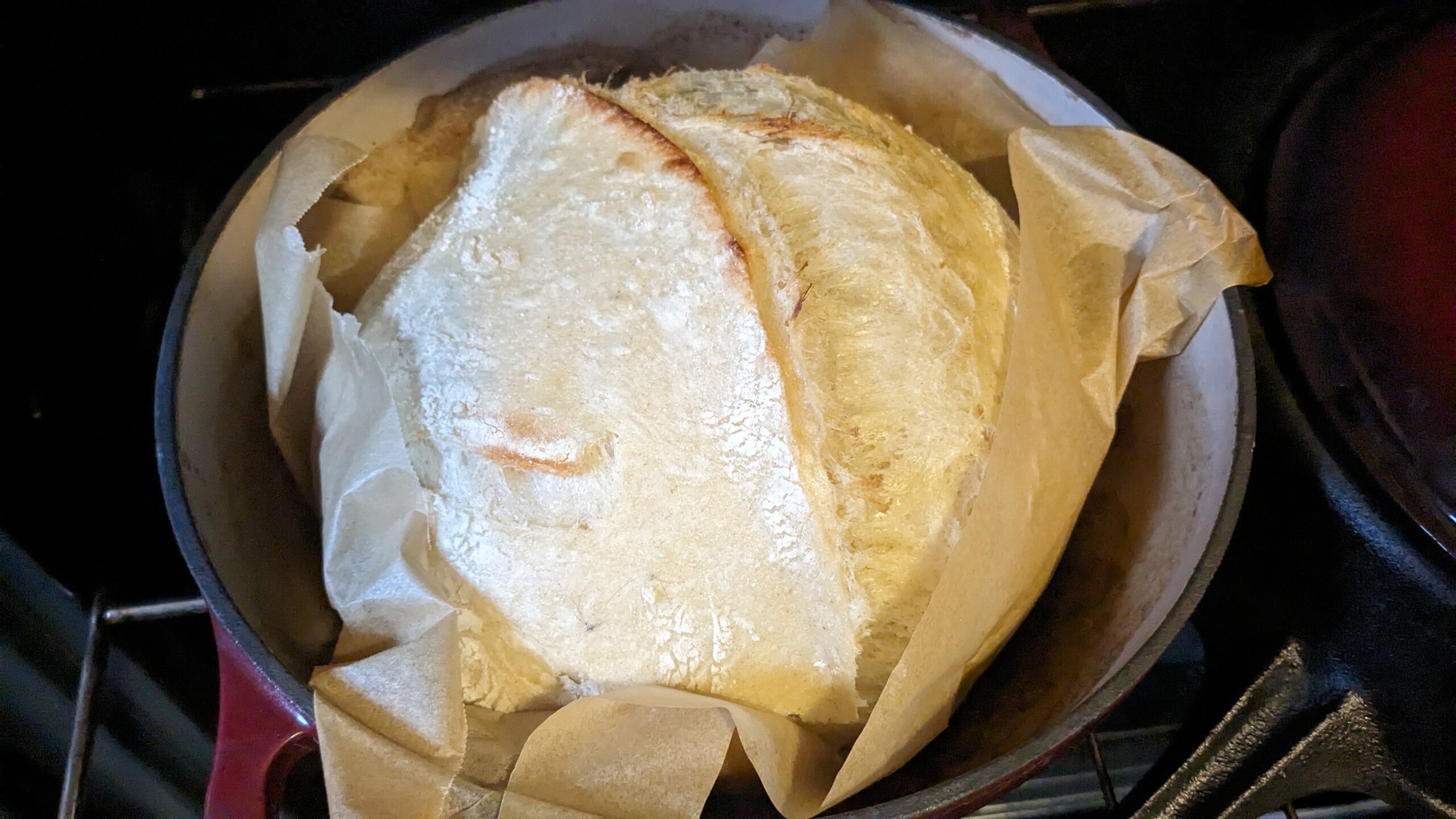 a pale risen and baked sourdough loaf