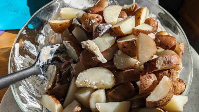 cut potatoes in a bowl 