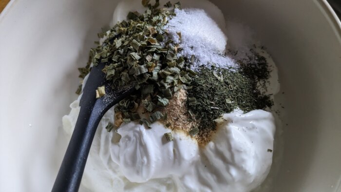 herbs on top of yogurt
