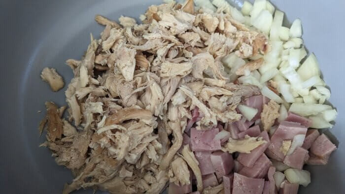 shredded chicken, onions, and ham