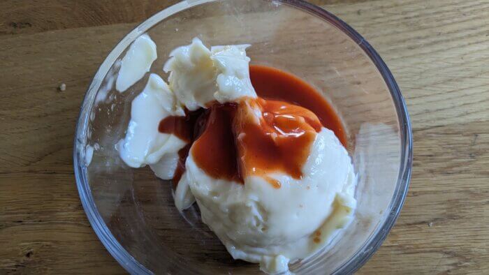 hot sauce and mayo in a bowl