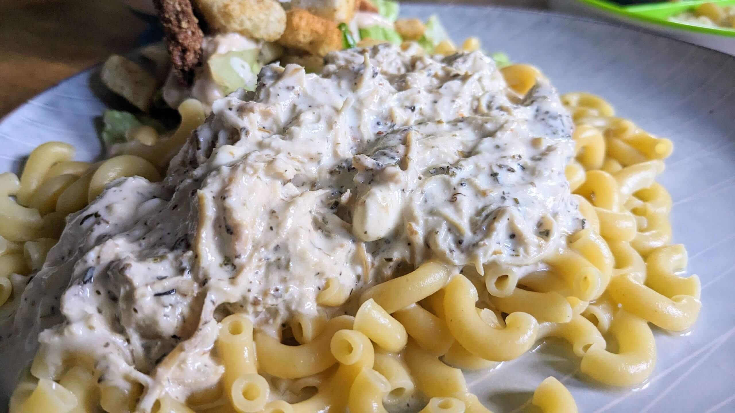 Crock pot creamy Italian chicken over pasta