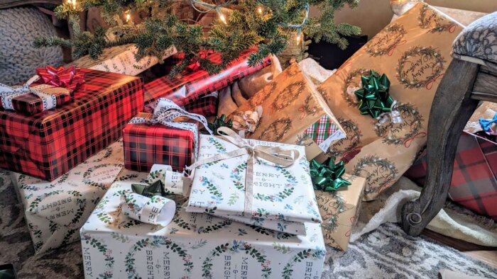 wrapped Christmas presents under a tree