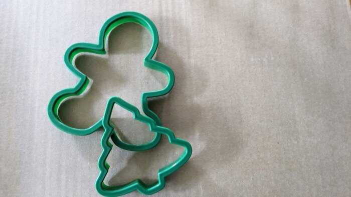 cookie cutters laying on cardboard