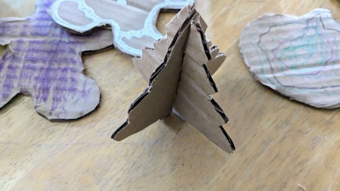 a 3D Christmas tree shape from cardboard