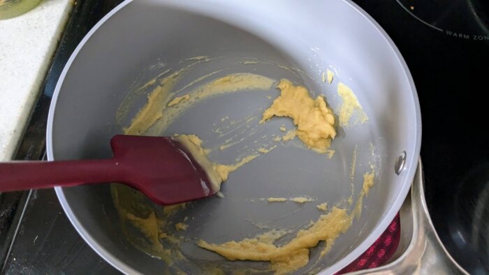 a roux being made in a caraway pot