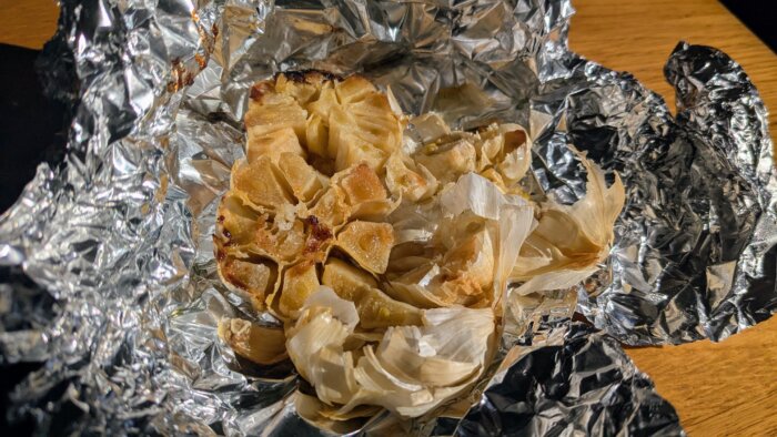 oven roasted garlic bulb heads in tin foil