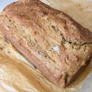 one loaf of sweet potato bread on parchment paper