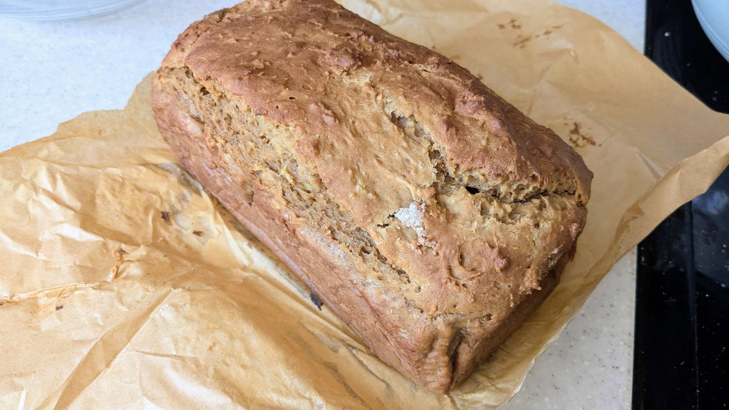one loaf of sweet potato bread on parchment paper
