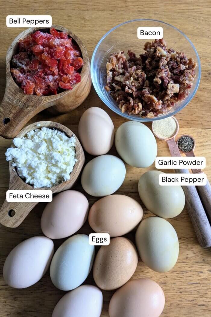 ingredients for breakfast egg cups laid out on a counter top in measured portions