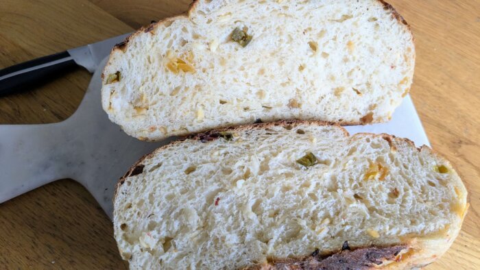 cowboy candy sourdough bread loaf cut in half