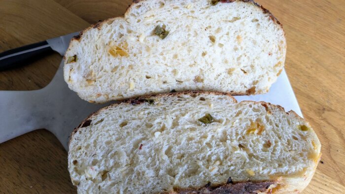 cowboy candy sourdough bread loaf cut in half