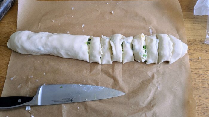 jalapeno pinwheels being cut into slices