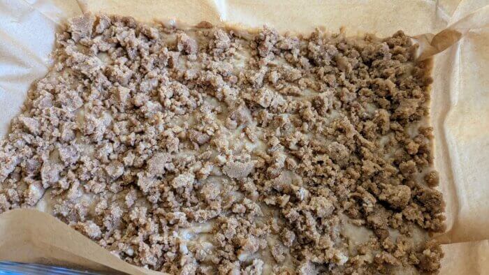 coffee cake crumb on top of sourdough coffee cake batter