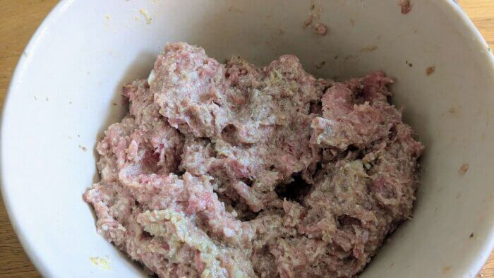 gluten free meatball ingredients mixed in a bowl