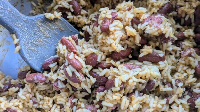 Arroz con habichuelas cooked in a pot (Spanish Yellow Rice)